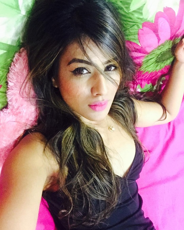 Nia Sharma on bed
