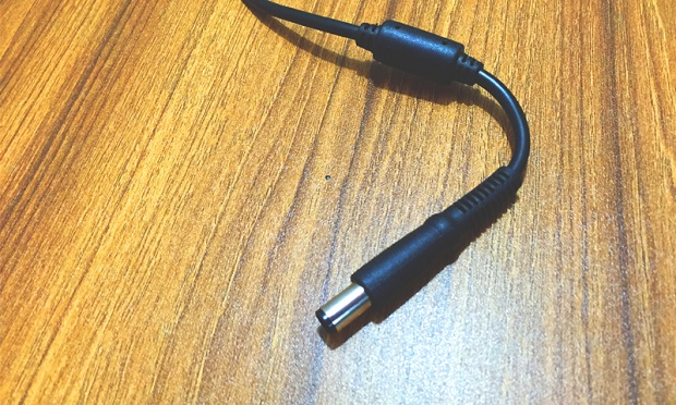 Cylinder on the laptop charging cord is for