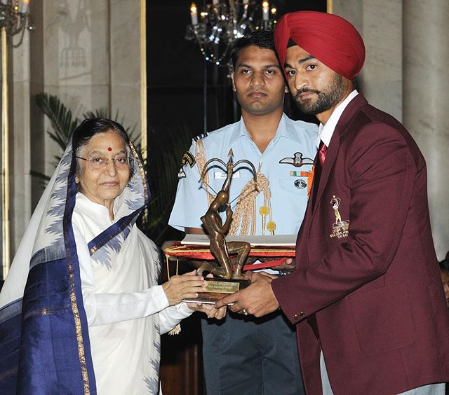 Sandeep Singh receiving award