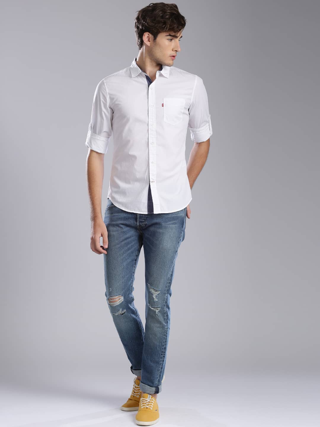 Male Model wearing Mid Rise jeans
