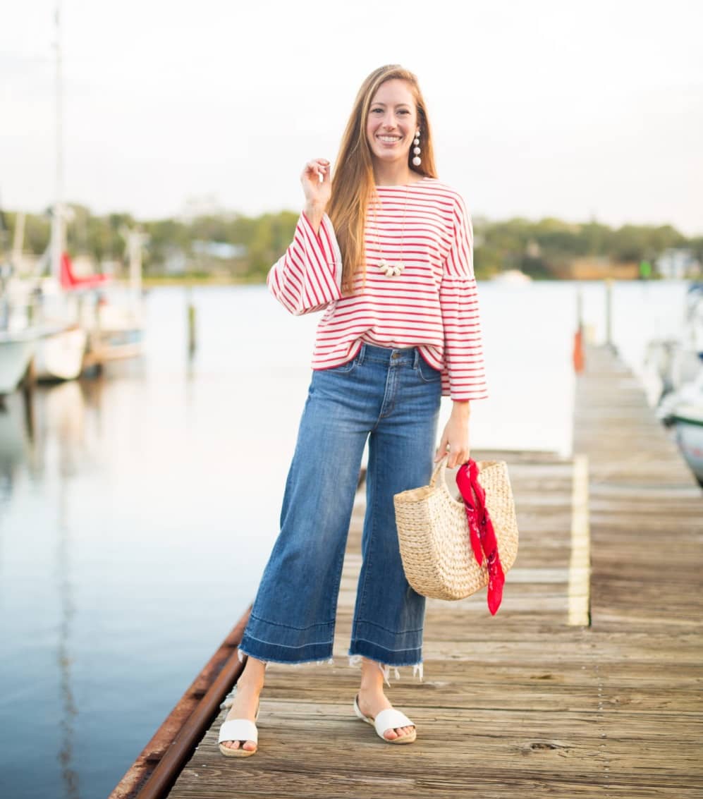 girl wearing wide leg jeans