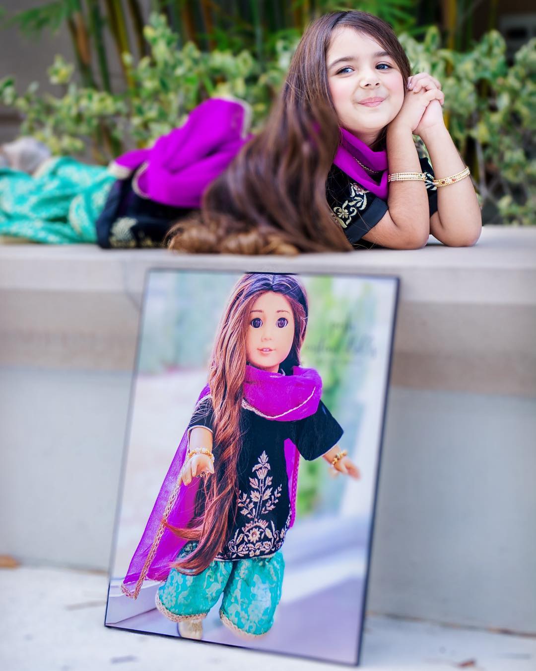 Miah Dhanani with doll