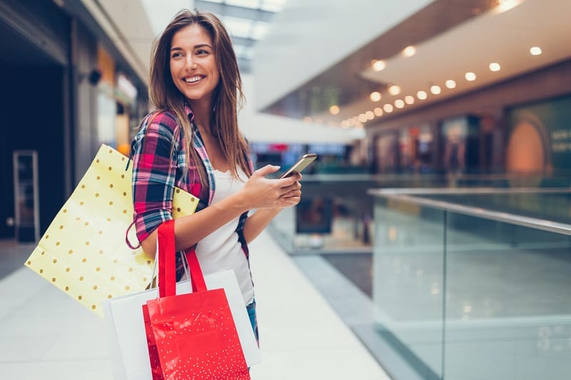 Woman enjoying shopping in mall