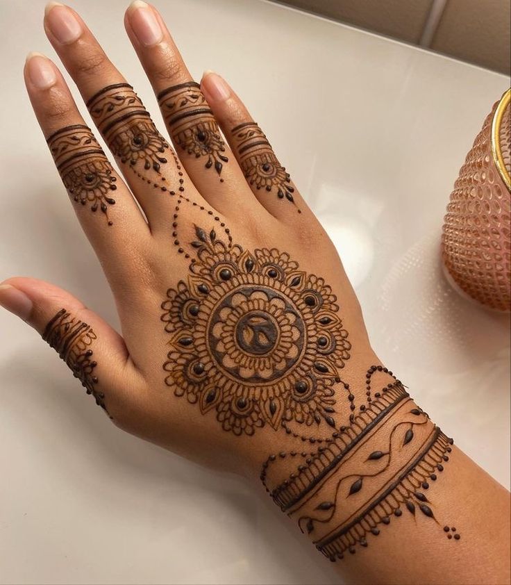 ornamental mehndi backhand