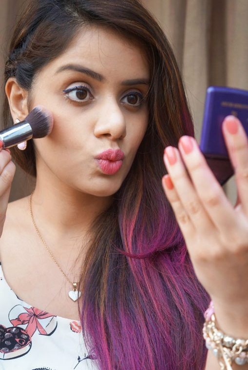Indian girl doing makeup