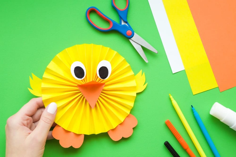 Fun craft with paper and scissor kids