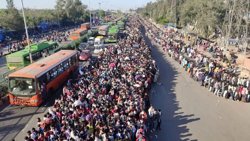 Migrants in lockdown waiting for bus