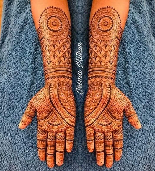 Symmetrical full hand mehndi design