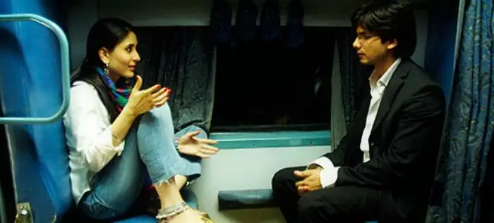 couple traveling in india train