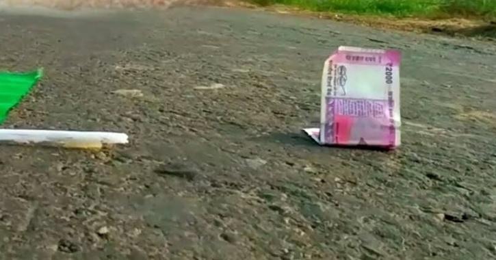 indian rupee on road
