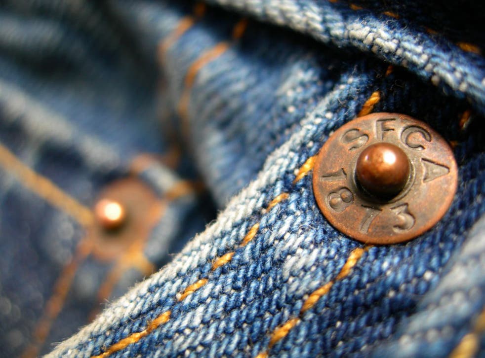 small metal button at the corner of the jeans