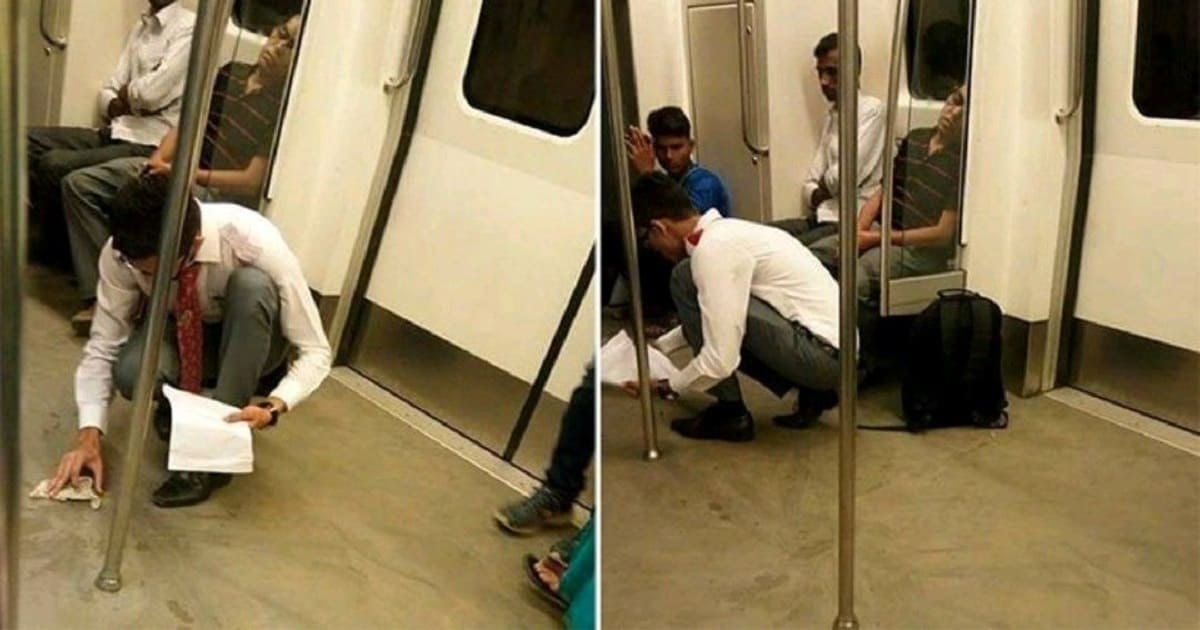 boy clean floor Delhi Metro