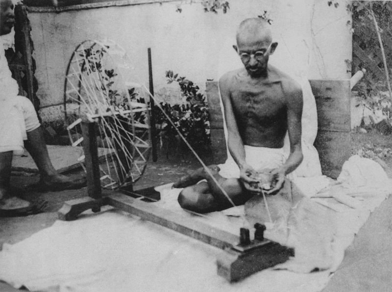 Mahatma Gandhi spinning cotton thread