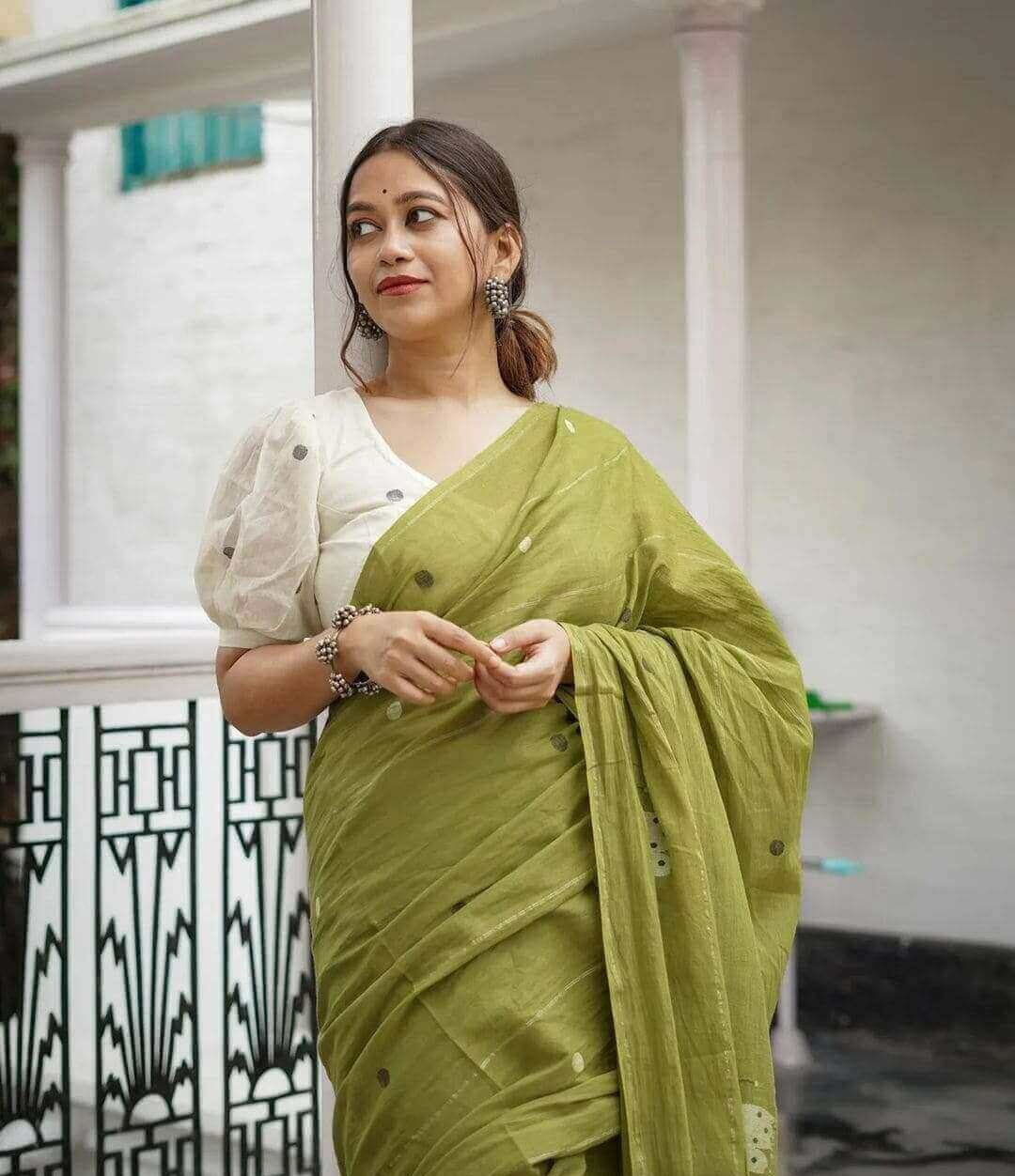 Kaisori Malhar Dabu Olive Green Silk Dabu Cotton saree