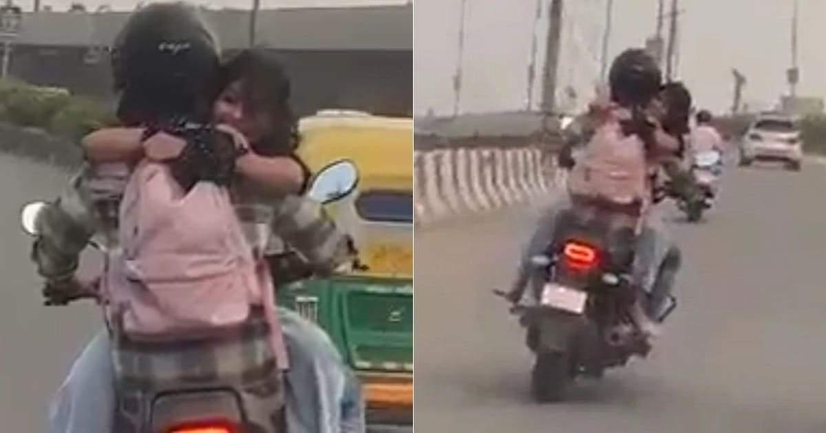 Couple Romancing On Bike in Delhi