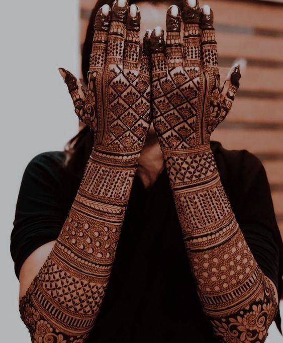 detailed full hand mehndi design