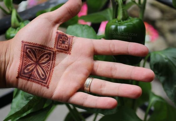 simple back hand mehndi for grooms