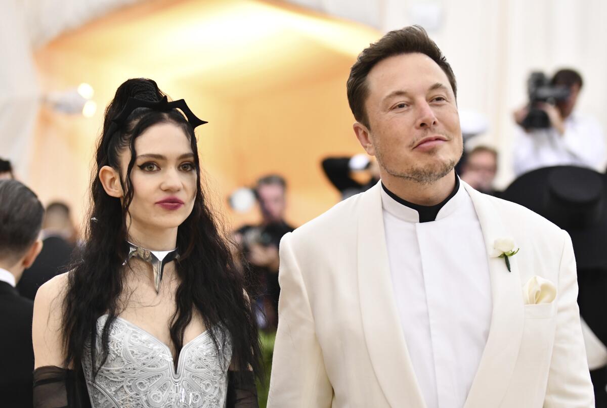 elon musk with Grimes