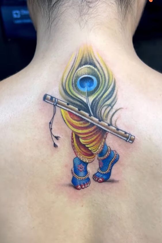 Skin Machine Tattoo Studio - Peacock feather with flute tattoo by  @aakashchandani_ @skinmachinetattoo . #peacockfeathertattoo #krishnatattoo  #lordkrishnatattoo #skinmachinetattoo #aakashchandani | Facebook