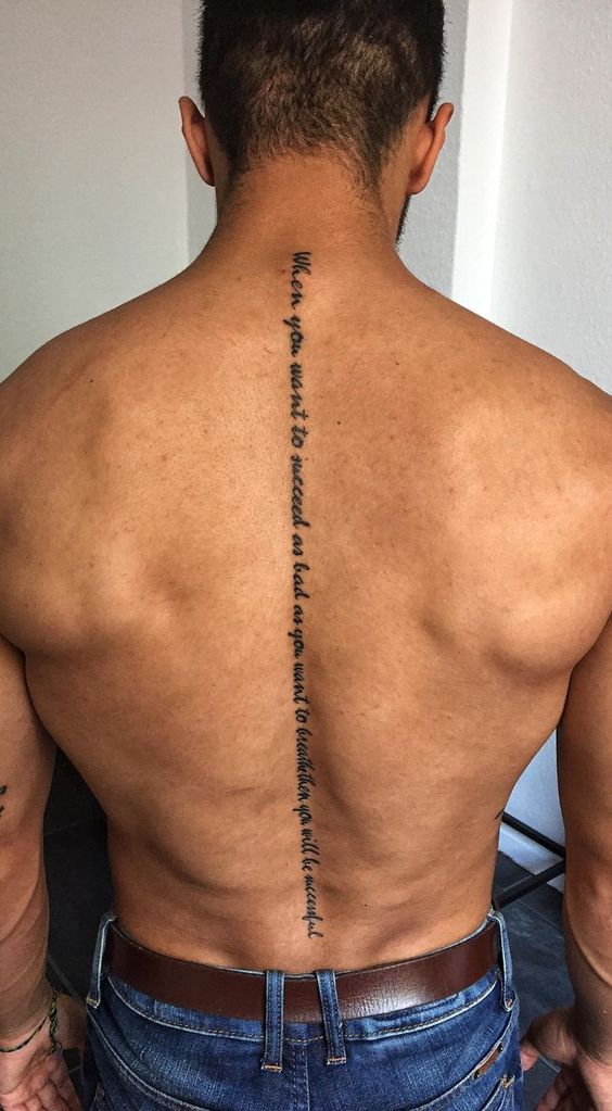 men spine tattoo