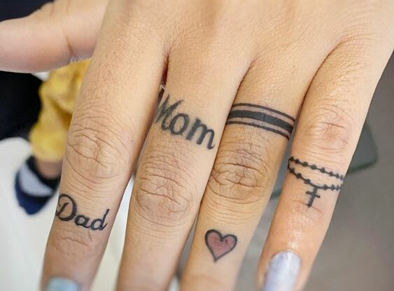 mom dad finger tattoo
