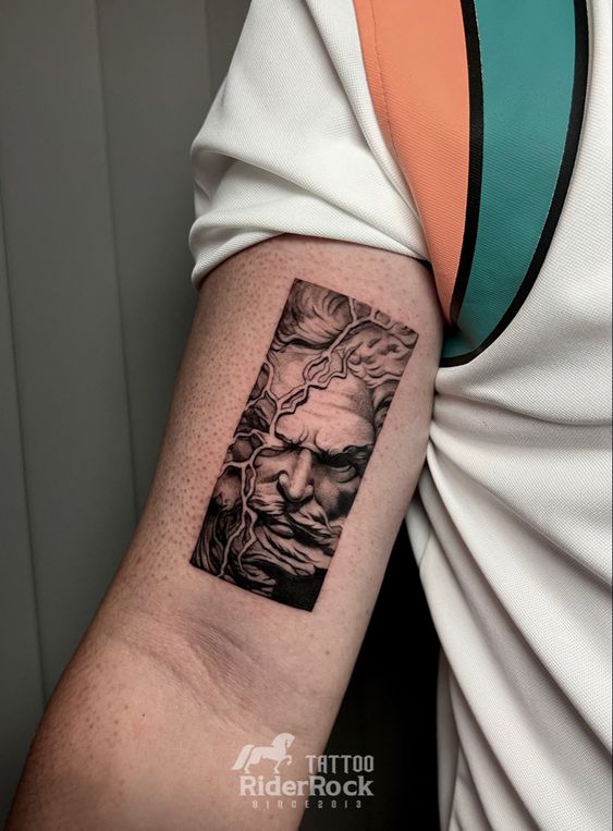 zeus hand tattoo