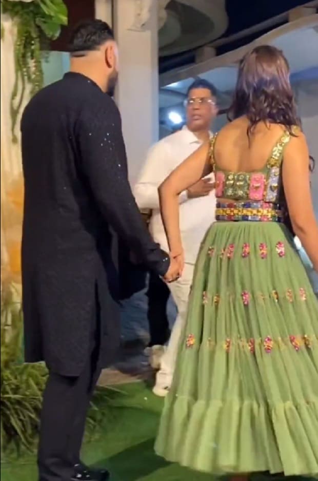 badshah and mrunal thakur holding hands