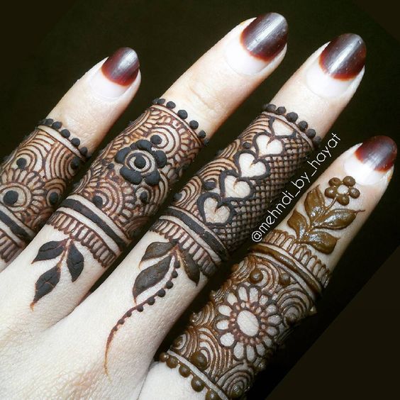 finger heart mehndi design