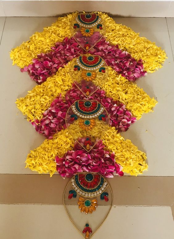 symmetric flower rangoli design