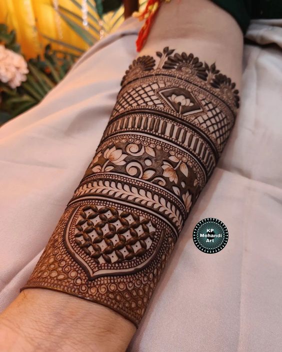 detailed forearm mehndi design