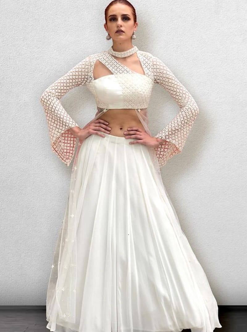 Asymmetrical-cut-out-stylish-fancy-net-blouse-design