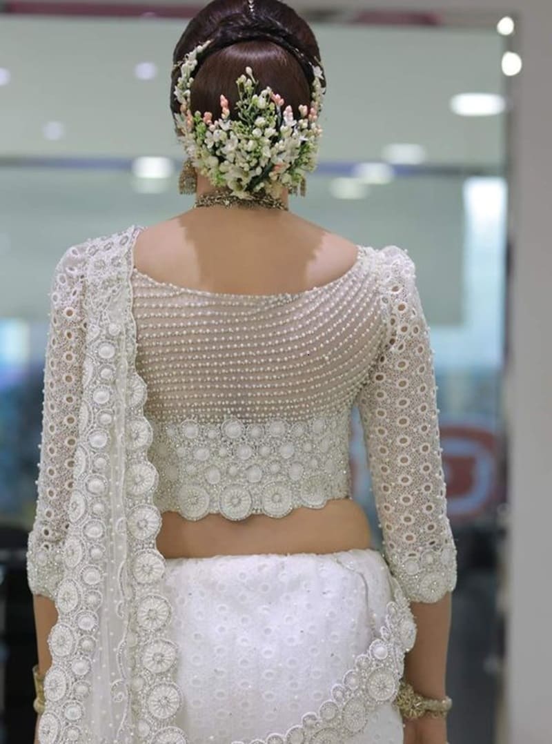 Pearl-embellished-back-net-saree-blouse-designs