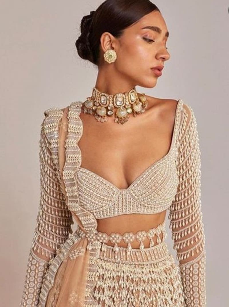 Pearl-embellished-with-deep-neck-simple-net-blouse-design