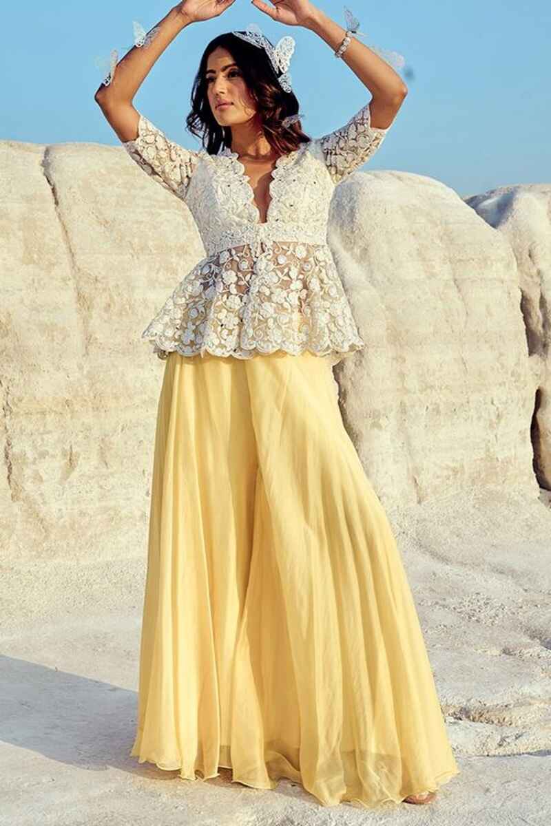 Peplum-style-with-zardosi-work-stylish-fancy-net-blouse-design