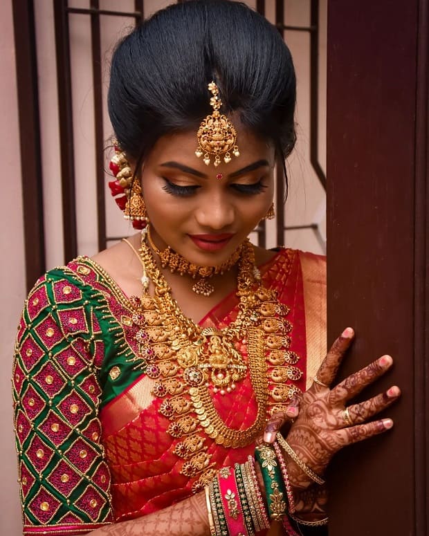 Puffed up front South Indian bridal hairstyle
