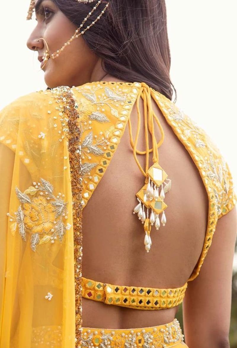 Triangle-cut-out-modern-lehenga-blouse-back-designs