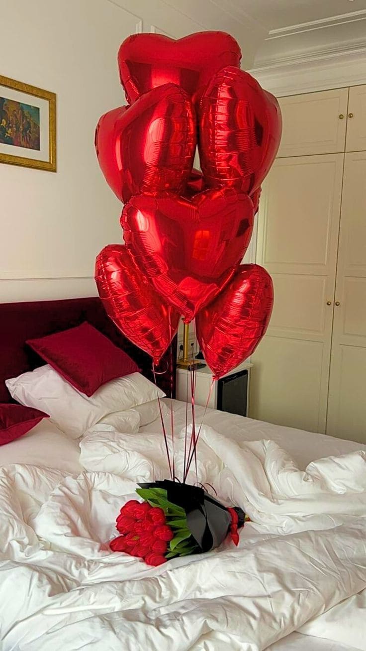 bouquet of roses with heart shaped balloons