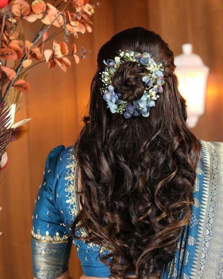 half bun adorned with blue flowers