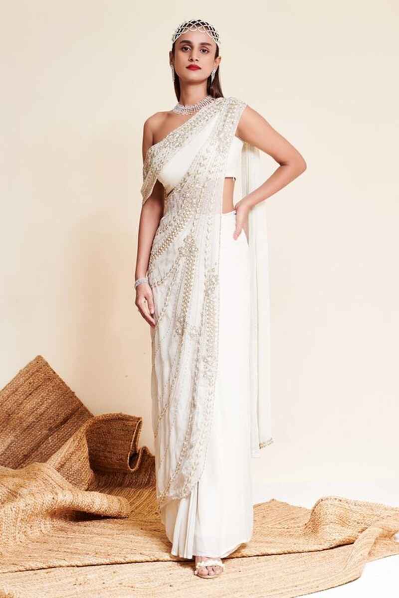 Assymetrical-neckline-latest-blouse-designs-for-fancy-sarees