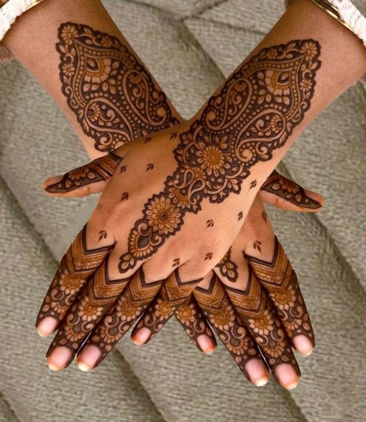 Back hand henna design with motifs