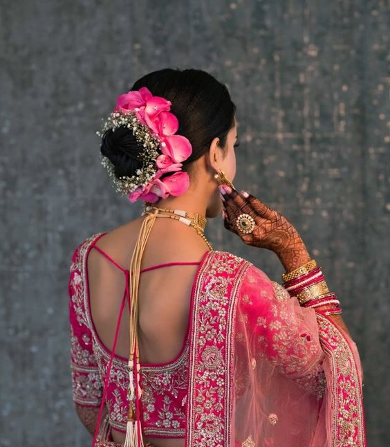 Bun styled with lotus petals