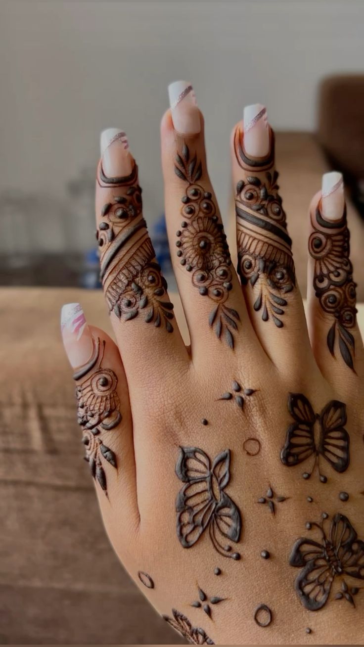 Butterfly mehndi design for back hand