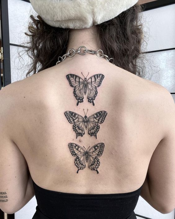 Butterfly spine tattoo