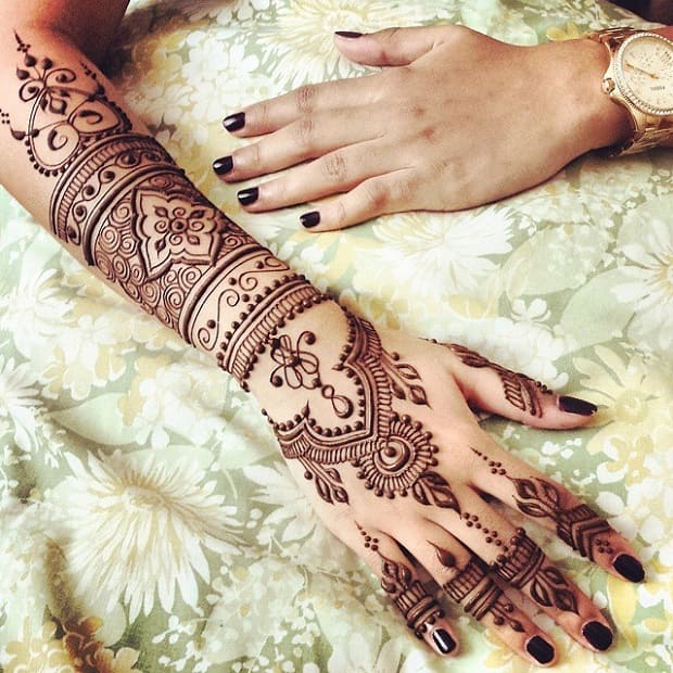 Imitating jewelry back full hand bridal mehndi design