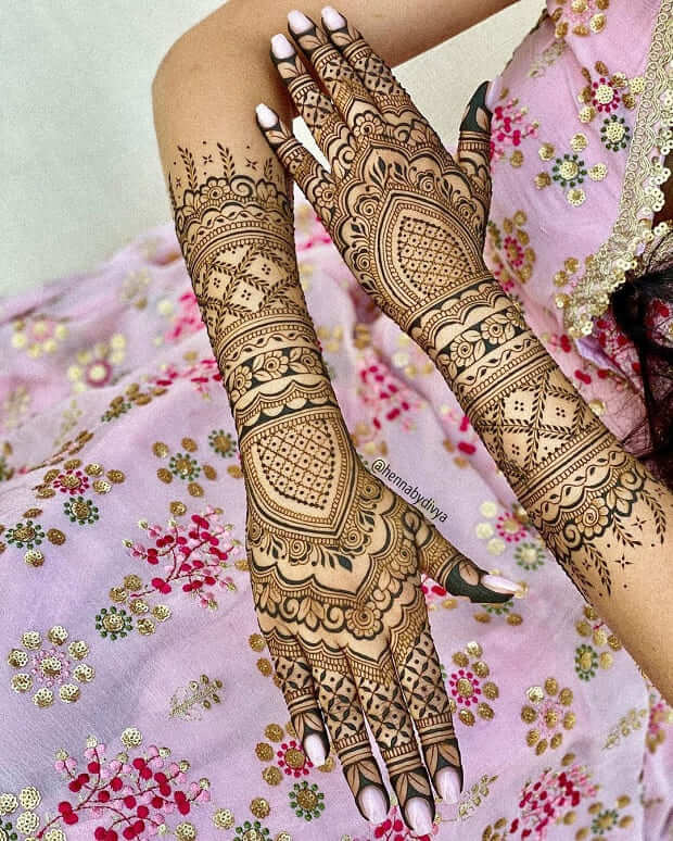 Intricately detailed back full hand bridal mehndi design