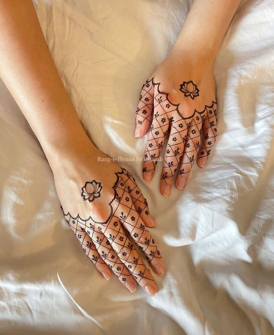 Lotus motif paired with mesh henna design