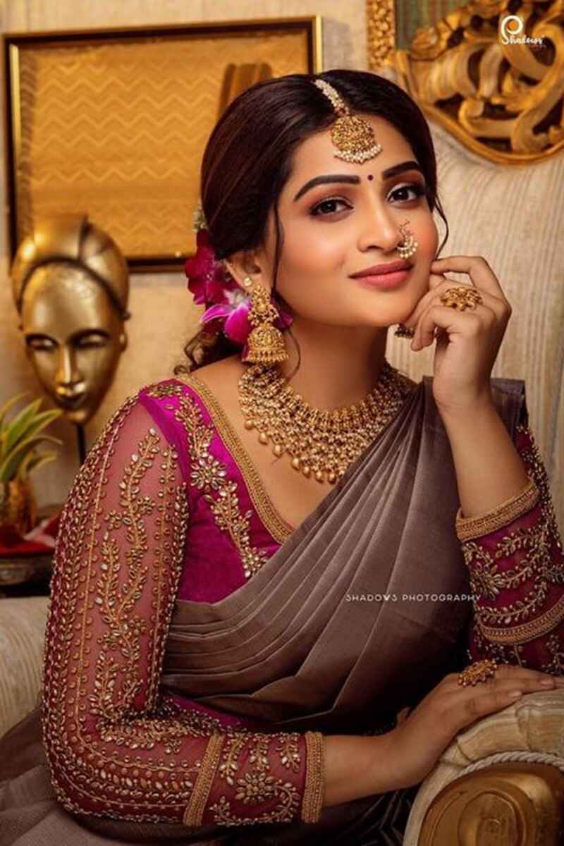Sheer-full-sleeves-with-maggam-work-bridal-saree-blouse-designs