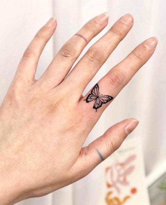 Simple finger tattoo