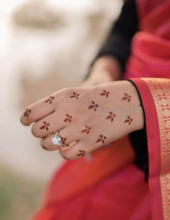 Small butterfly henna designs
