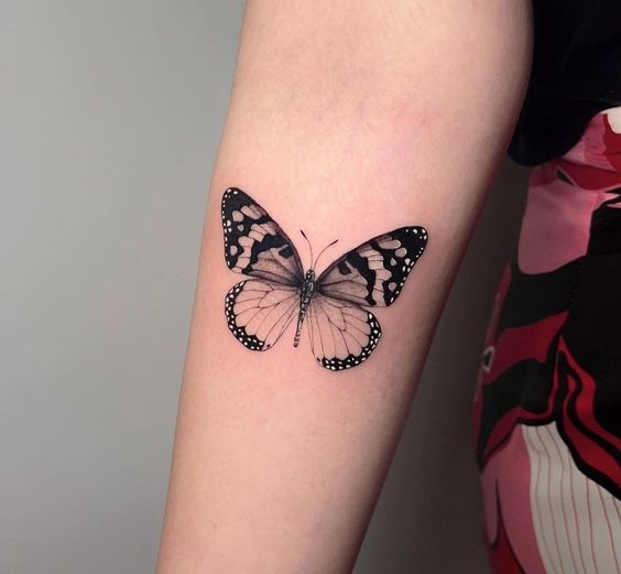 Tattoo with monarch butterfly design